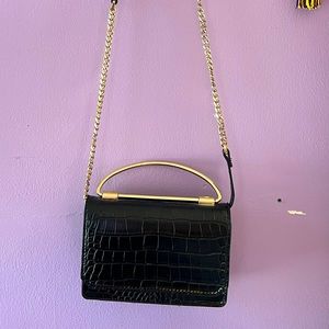 Mini clutch comes with strap